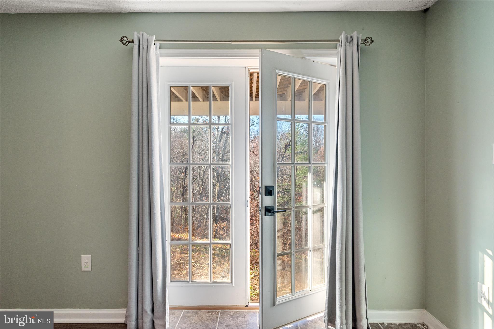 181 Brook View Road Front Royal, VA 22630 - Photo 27 of 47 a view of a glass door and a window