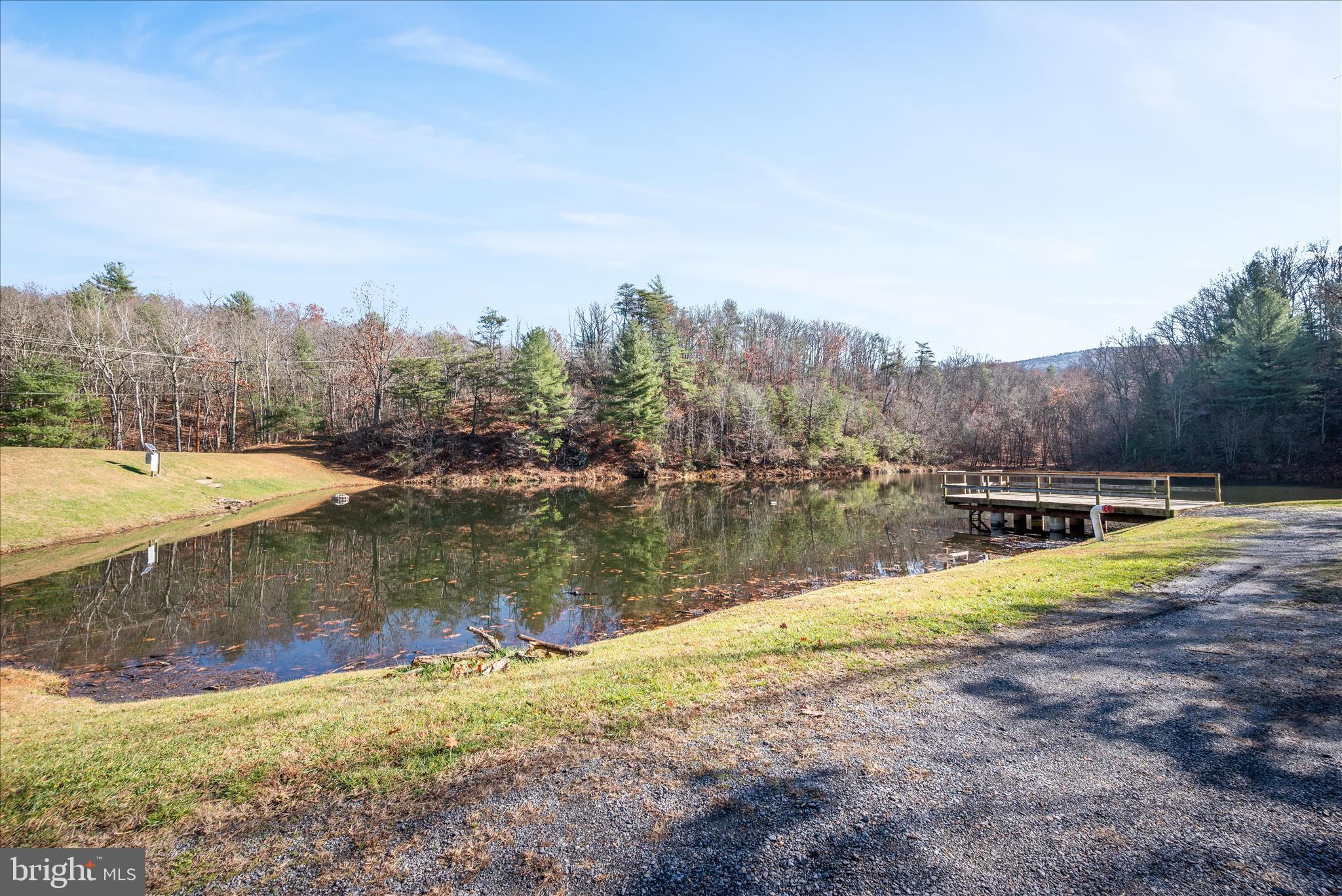181 Brook View Road Front Royal, VA 22630 - Photo 30 of 47 a view of a lake with a mountain in the background