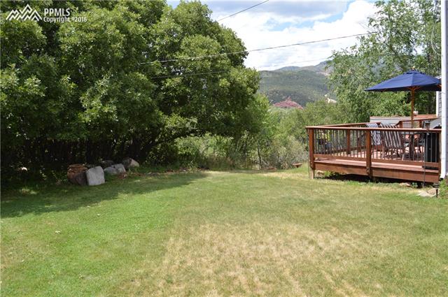 142 Clarksley Road Manitou Springs, CO 80829 - Photo 8 of 10 Front yard with view of deck