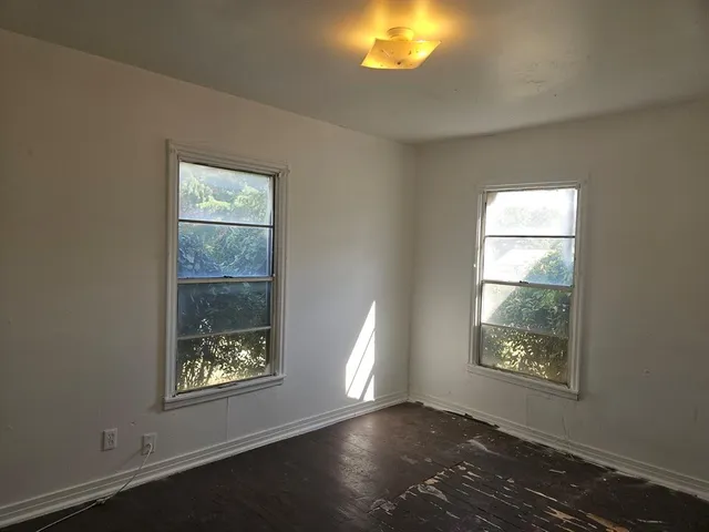 a view of an empty room and window