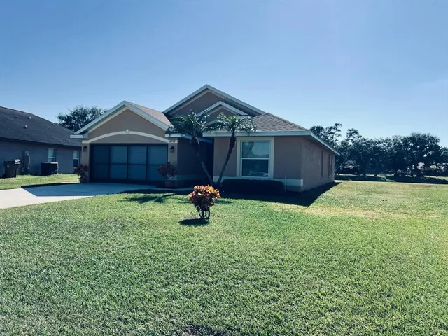 a house view with a garden space