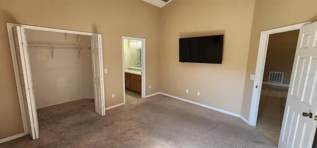 a view of a livingroom with wooden floor