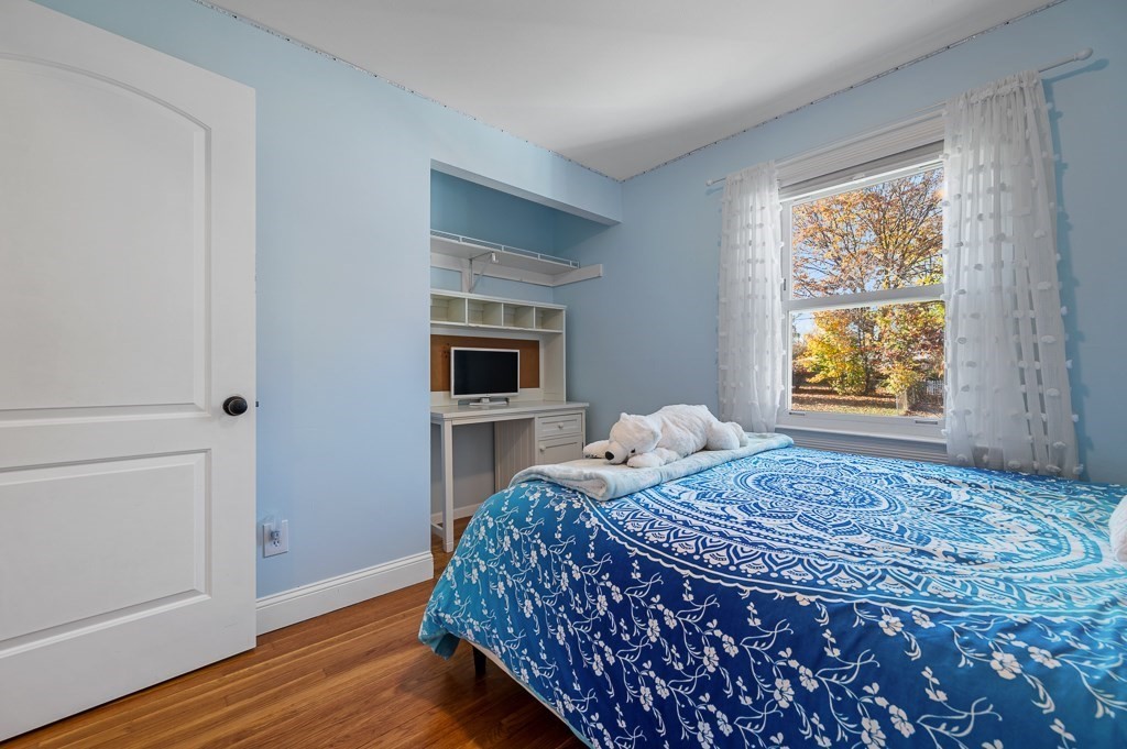 104 Conrad Road Marlborough, MA 01752 - Photo 13 of 34 a bedroom with a bed and a window