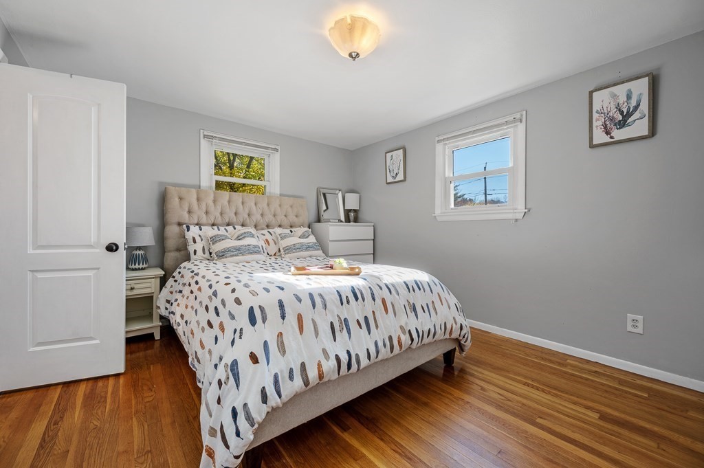 104 Conrad Road Marlborough, MA 01752 - Photo 19 of 34 a bedroom with a bed and a window