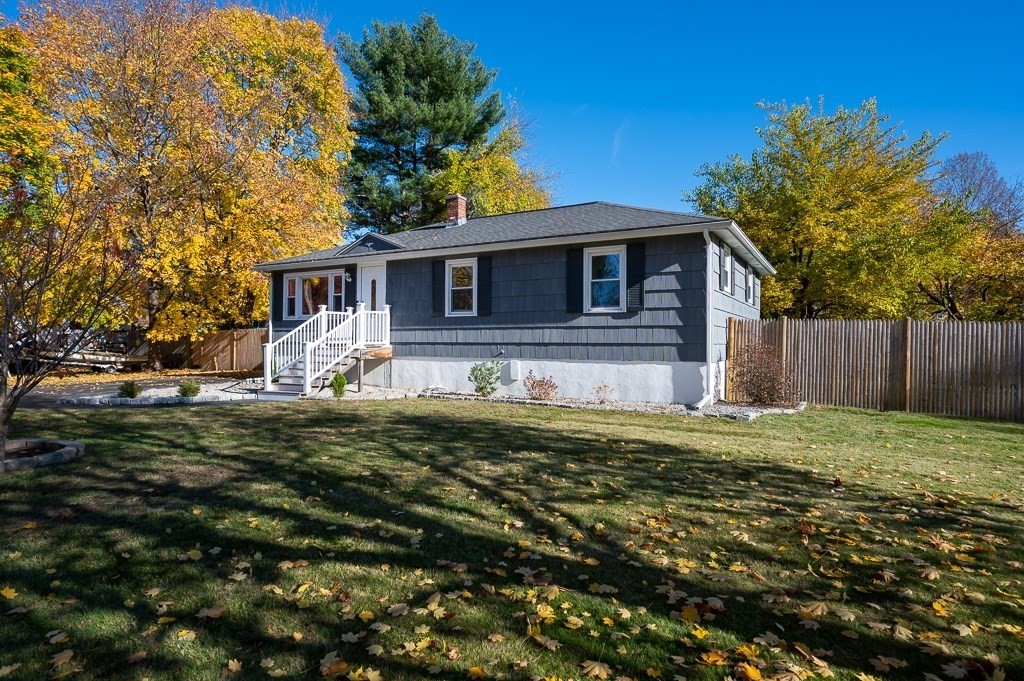 104 Conrad Road Marlborough, MA 01752 - Photo 2 of 34 a front view of a house with a yard
