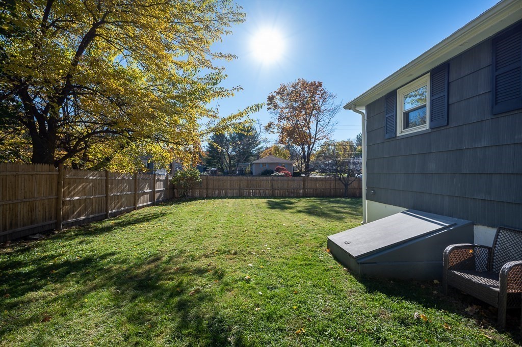 104 Conrad Road Marlborough, MA 01752 - Photo 29 of 34 a backyard of a house with lots of green space