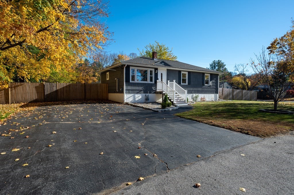 104 Conrad Road Marlborough, MA 01752 - Photo 3 of 34 a front view of a house with a yard