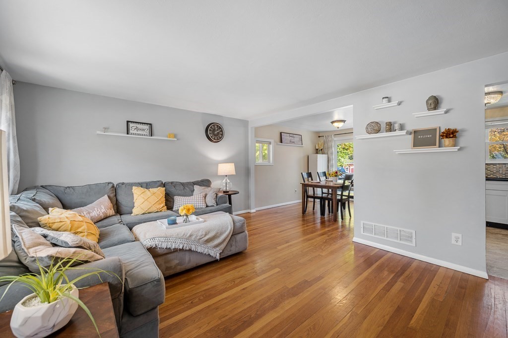 104 Conrad Road Marlborough, MA 01752 - Photo 4 of 34 a living room with furniture and a table