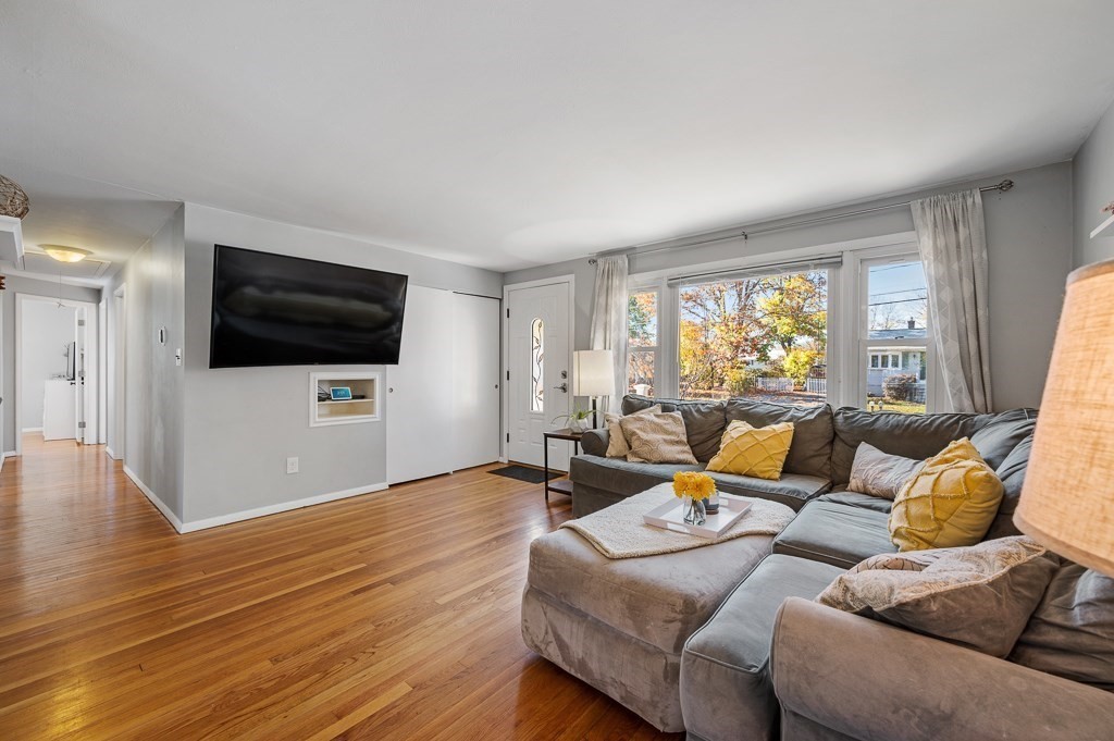 104 Conrad Road Marlborough, MA 01752 - Photo 5 of 34 a living room with furniture and a flat screen tv
