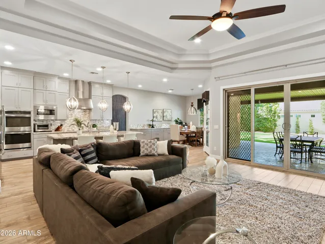 a bedroom with a bed and couch