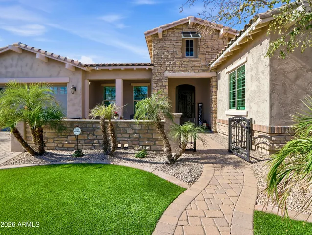 a building outdoor space with patio furniture and potted plants
