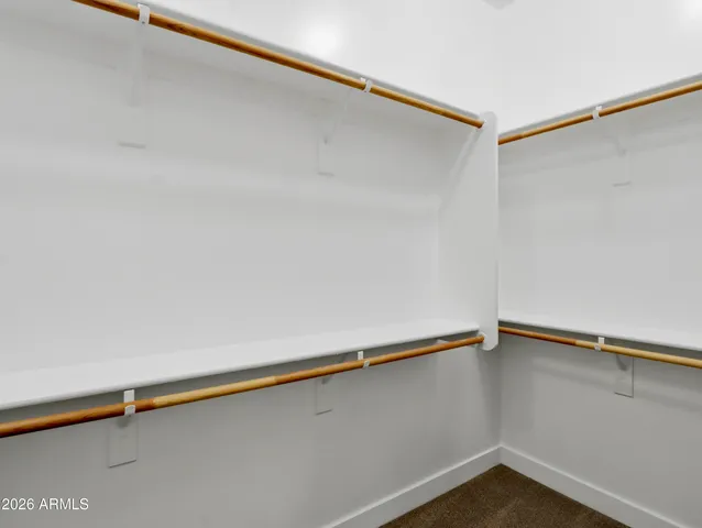 a view of a house with swimming pool and sitting area