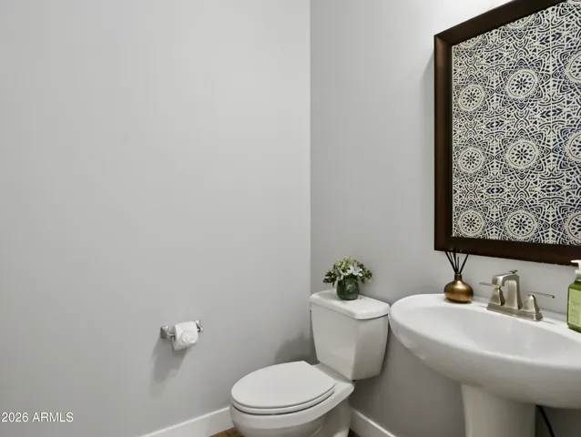 an aerial view of a residential houses with outdoor space