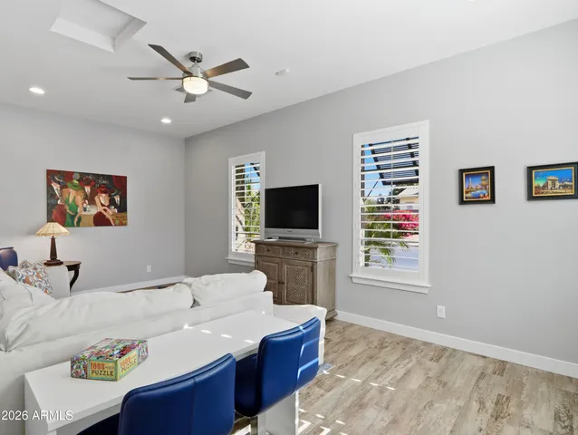 an aerial view of a house with a yard and plants