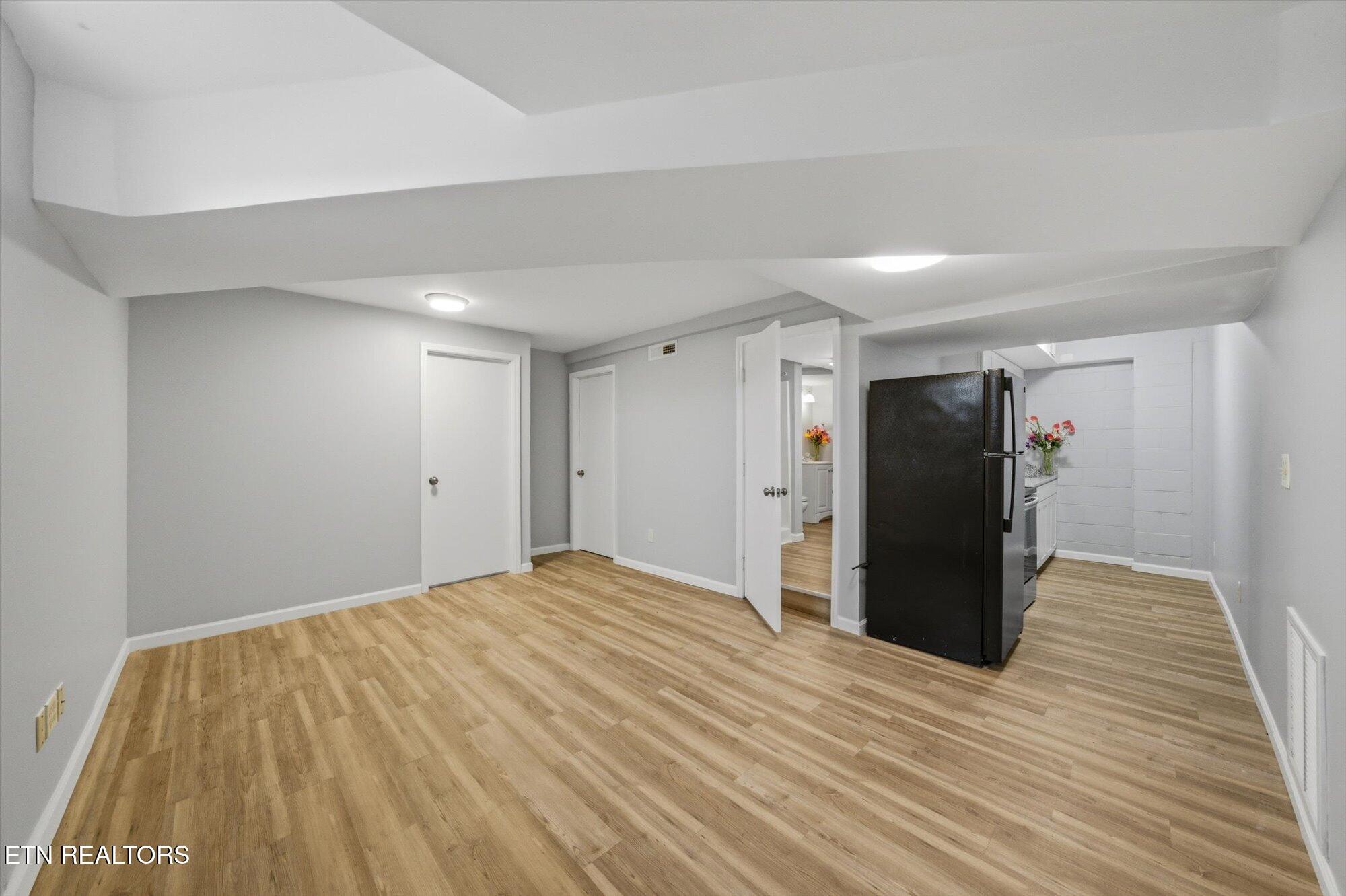144 North Illinois Avenue Oak Ridge, TN 37830 - Photo 19 of 35 Basement family, dining and kitchen area
