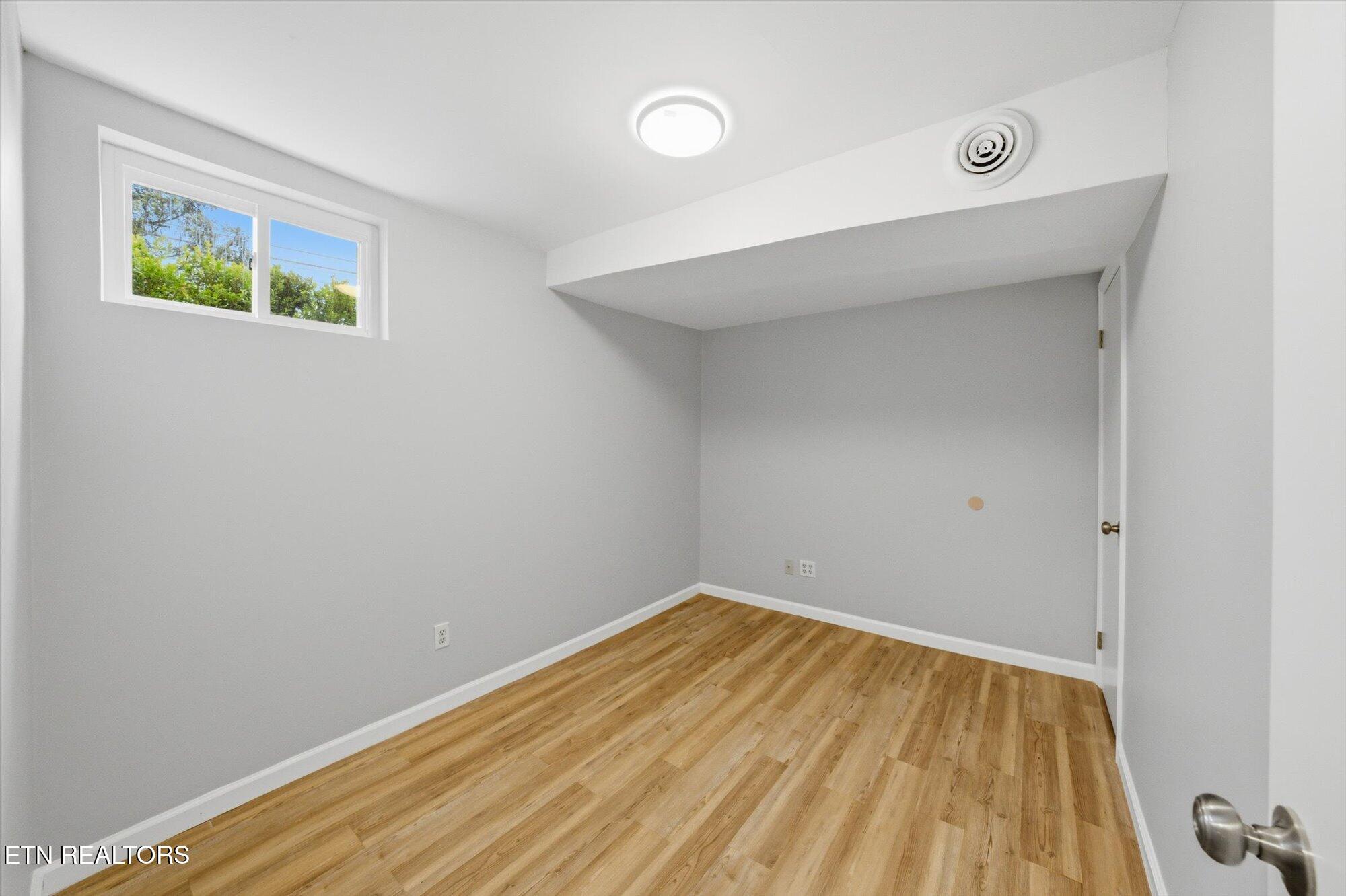 144 North Illinois Avenue Oak Ridge, TN 37830 - Photo 20 of 35 Basement Bedroom 1