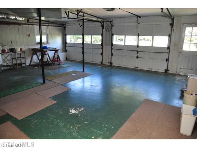 7012 Harperglen Road Clemmons, NC 27012 - Photo 14 of 16 Other. The large double garage features extra storage space.