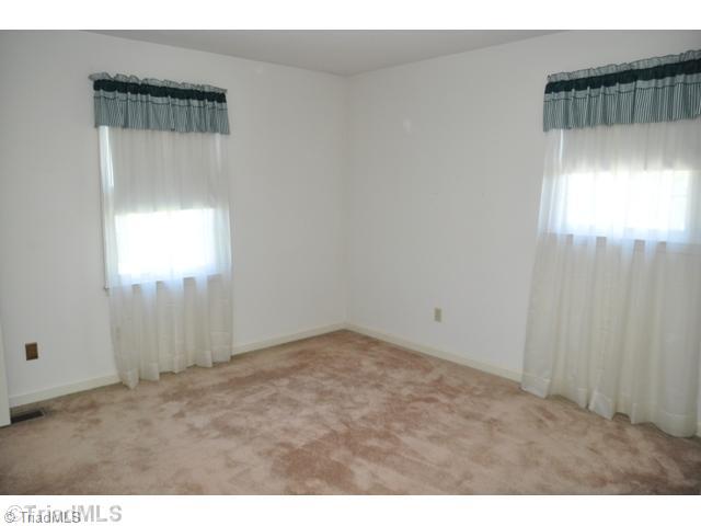 7012 Harperglen Road Clemmons, NC 27012 - Photo 9 of 16 2nd Bedroom. The main level 2nd bedroom.