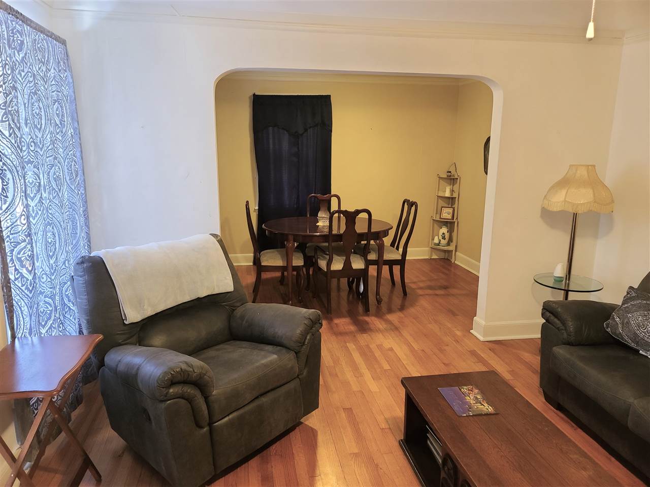 3732 Healey Road Memphis, TN 38111 - Photo 3 of 11 a living room with furniture and a lamp