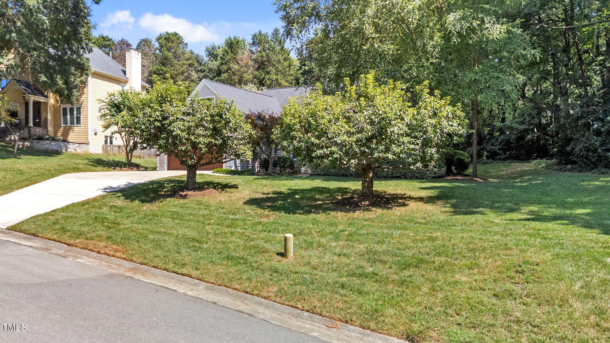 2613 Hawtree Drive Raleigh, NC 27613 - Photo 45 of 47 a view of a park with large trees