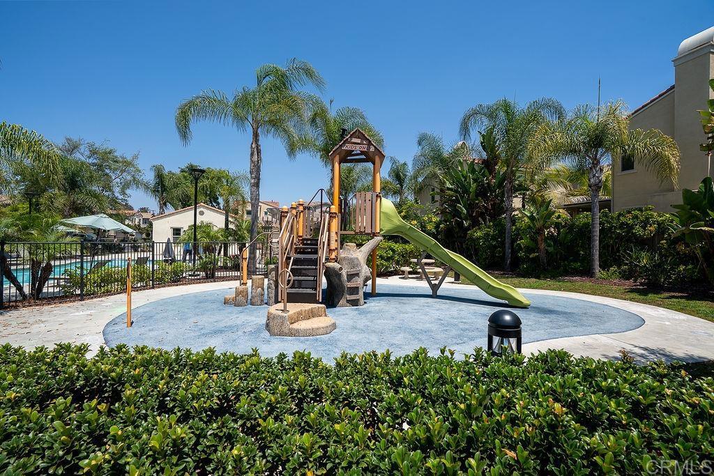 1132 Cherry Tree Lane Vista, CA 92084 - Photo 38 of 39 a view of a park with swings and slides