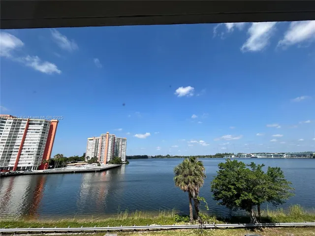 a view of swimming pool from a balcony