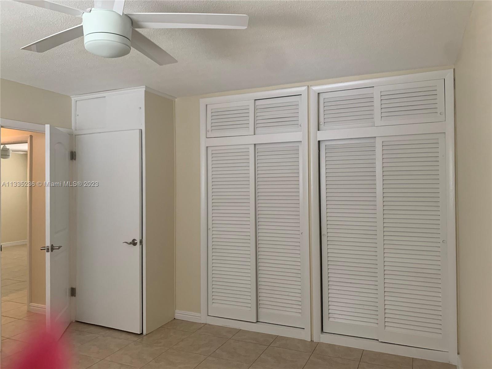 3500 Harrison Street, Unit 8 Hollywood, FL 33021 - Photo 15 of 59 an empty room with windows