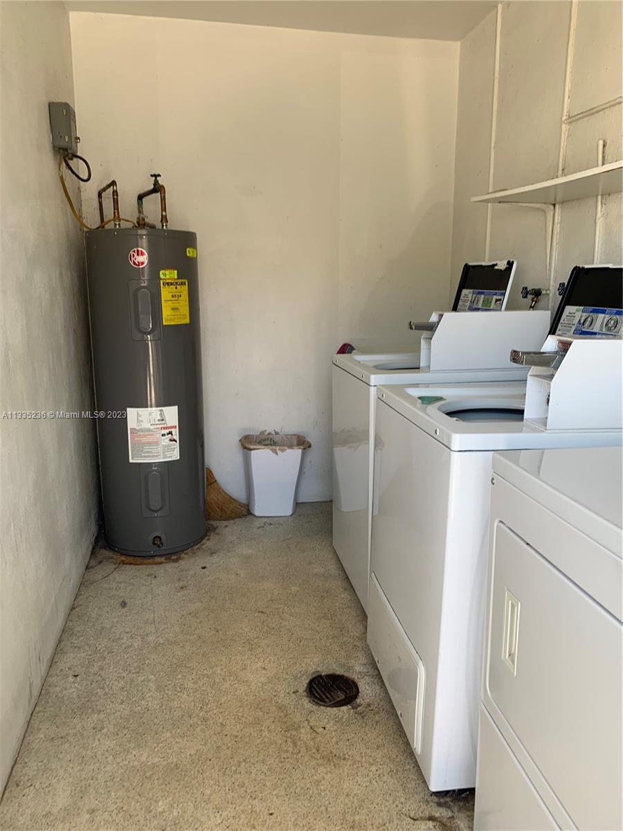 3500 Harrison Street, Unit 8 Hollywood, FL 33021 - Photo 23 of 59 a utility room with dryer and washer