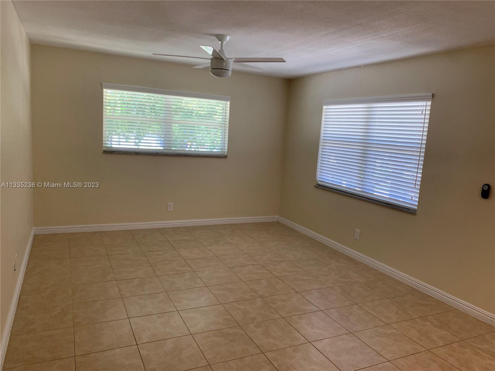 3500 Harrison Street, Unit 8 Hollywood, FL 33021 - Photo 42 of 59 a view of an empty room with a window