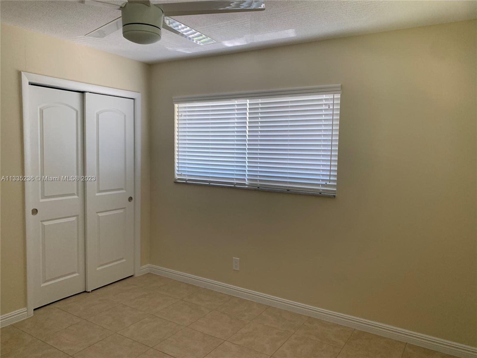 3500 Harrison Street, Unit 8 Hollywood, FL 33021 - Photo 46 of 59 an empty room with a window