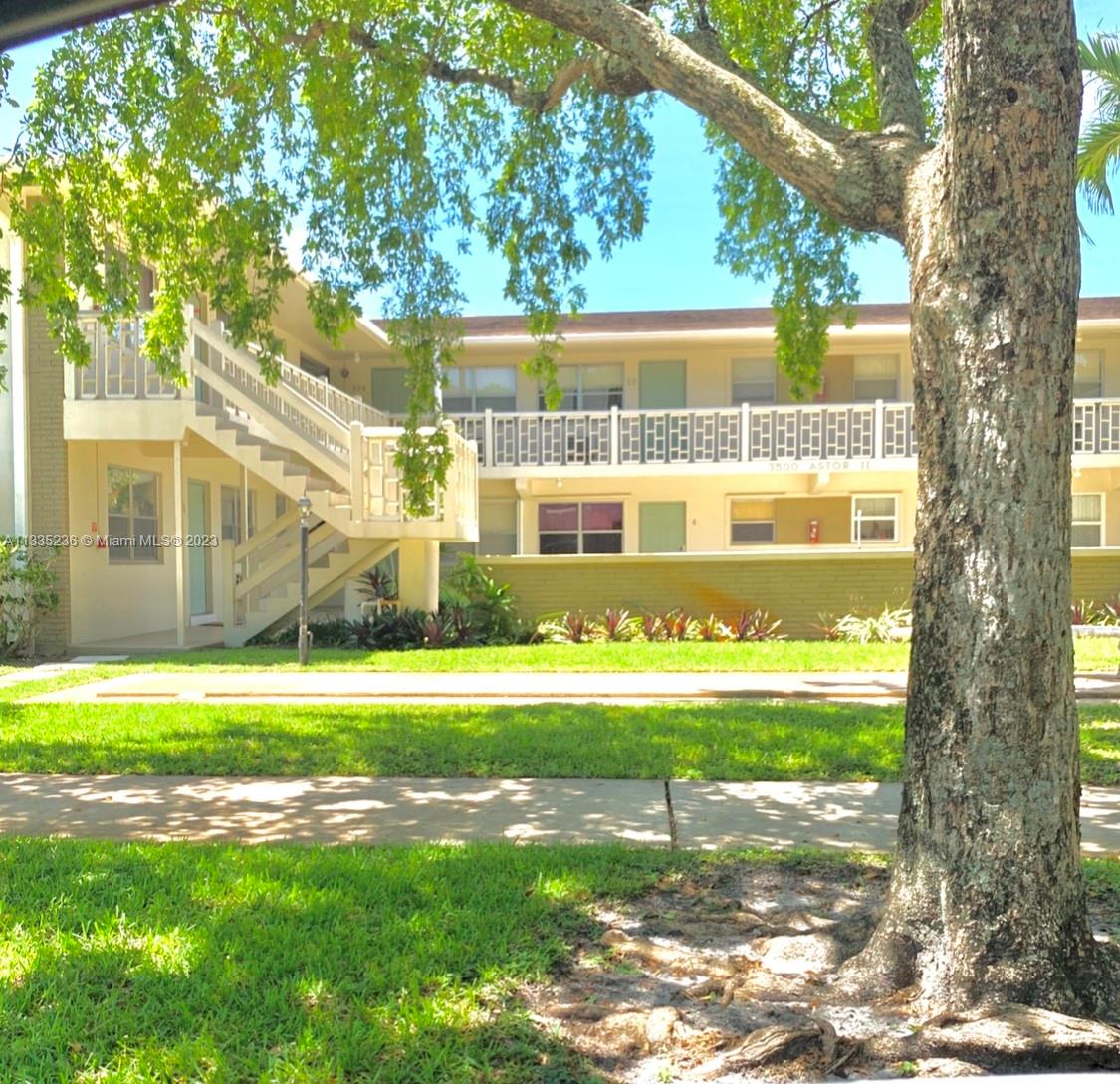 3500 Harrison Street, Unit 8 Hollywood, FL 33021 - Photo 58 of 59 a front view of a house with a yard