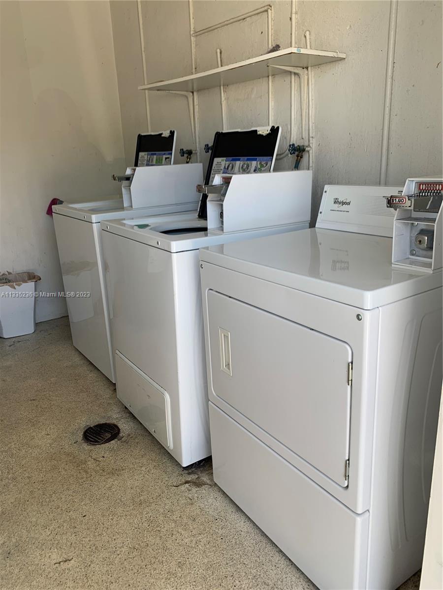 3500 Harrison Street, Unit 8 Hollywood, FL 33021 - Photo 9 of 59 a utility room with dryer and washer