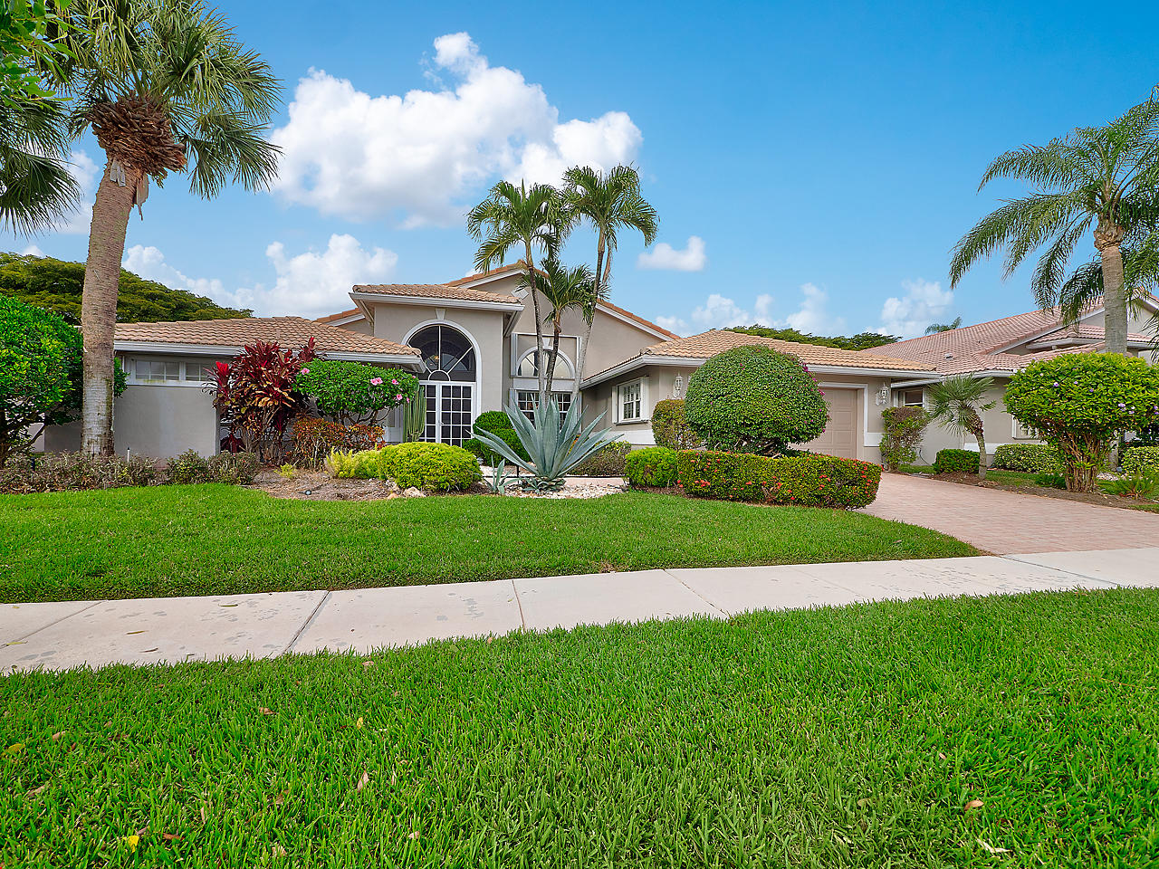 7062 Falls Road East Boynton Beach, FL 33437 - Photo 1 of 26 Front Exposure
