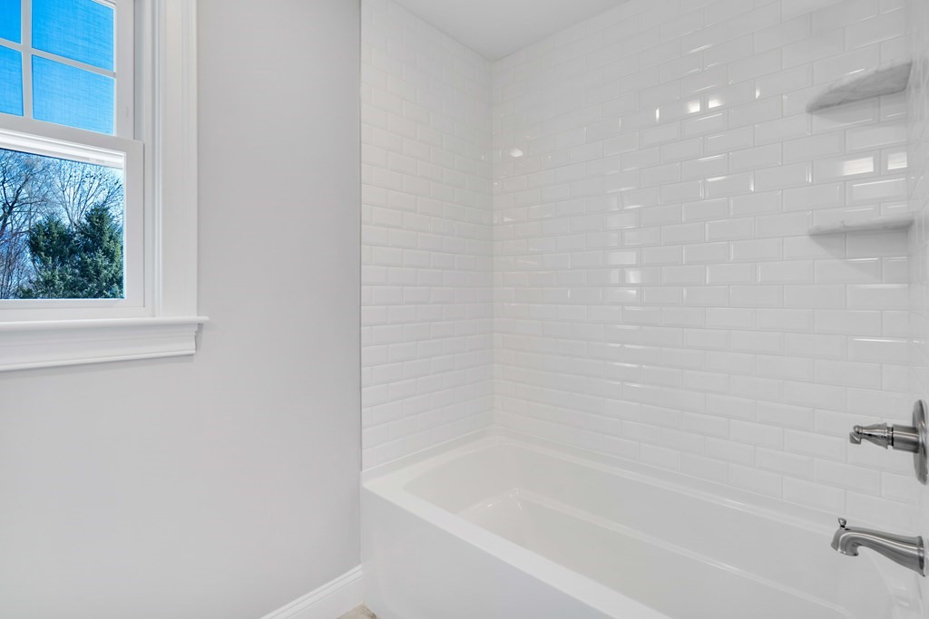 74 Robert Road Stow, MA 01775 - Photo 31 of 36 a close up of a bathtub curtain