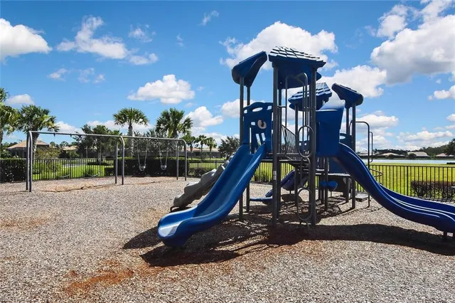 a view of swimming pool from a balcony