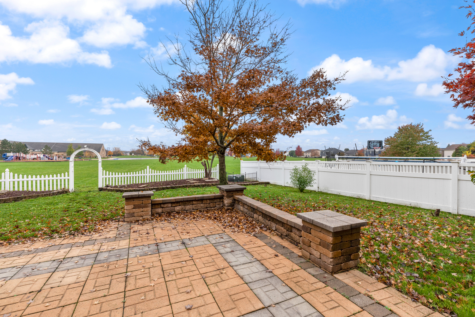 25231 Gettysburg Road Plainfield, IL 60544 - Photo 27 of 30 a park view with a bench and trees around
