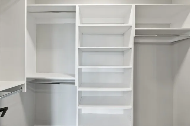 a bathroom with a double vanity sink mirror and double