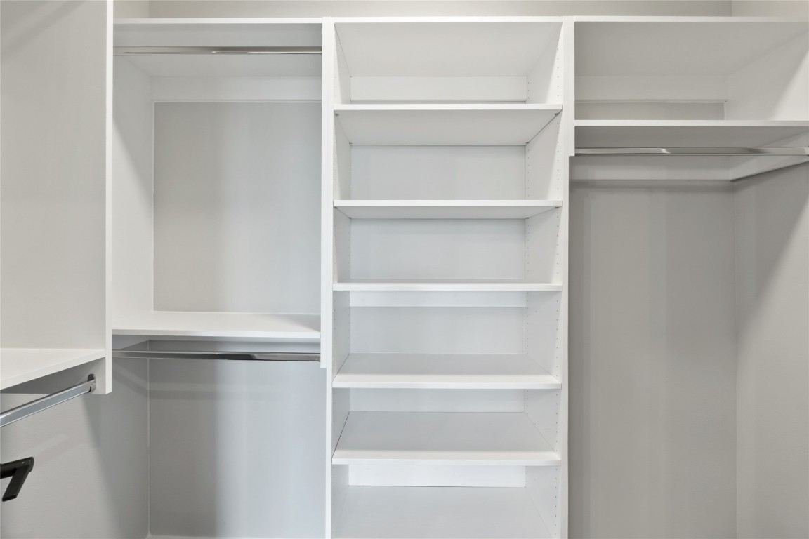 4510 Terry-O Lane, Unit 230 Austin, TX 78745 - Photo 16 of 39 a view of walk in closet with empty racks