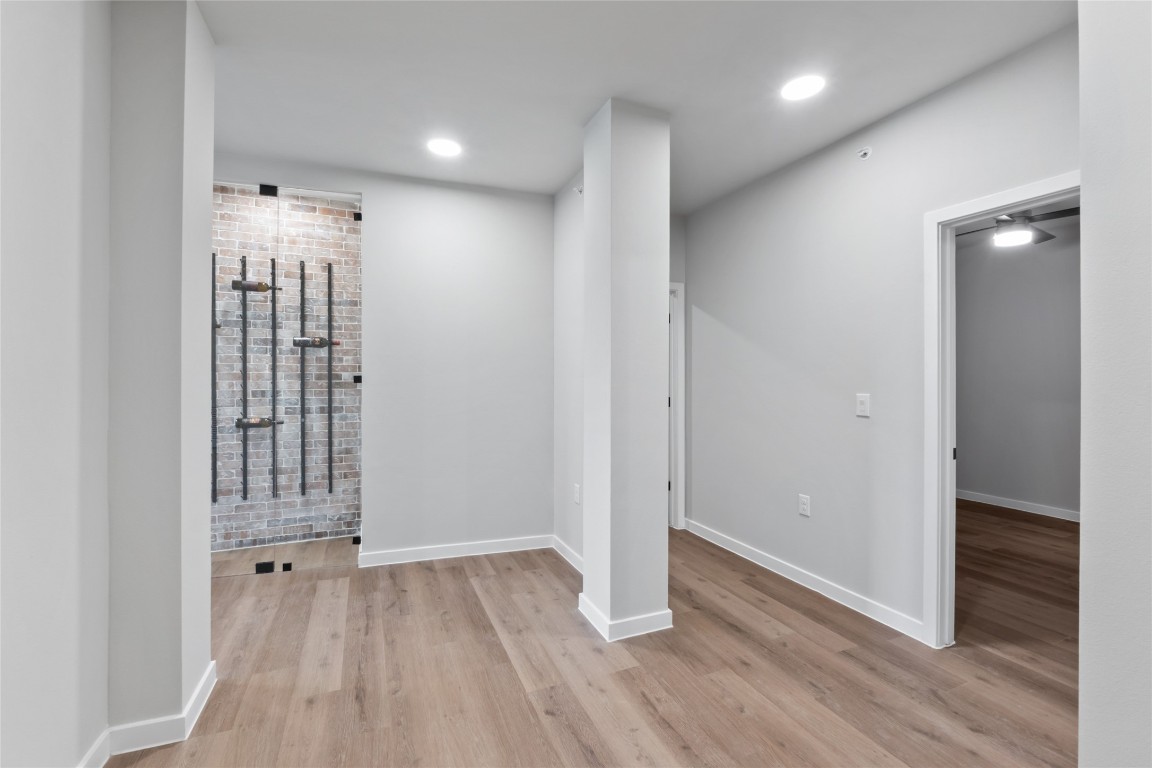 4510 Terry-O Lane, Unit 230 Austin, TX 78745 - Photo 17 of 39 wooden floor in an empty room with a window