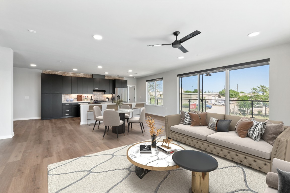 4510 Terry-O Lane, Unit 230 Austin, TX 78745 - Photo 4 of 39 a living room with furniture kitchen area and a large window
