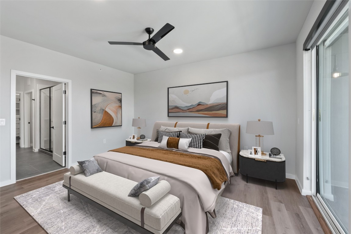 4510 Terry-O Lane, Unit 230 Austin, TX 78745 - Photo 7 of 39 a bedroom with a bed and a painting on the wall