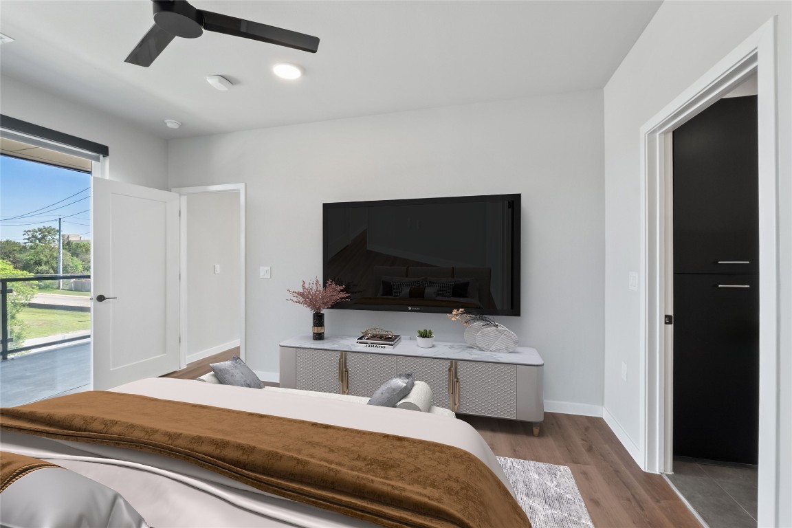 4510 Terry-O Lane, Unit 230 Austin, TX 78745 - Photo 8 of 39 a bedroom with bed and a flat screen tv