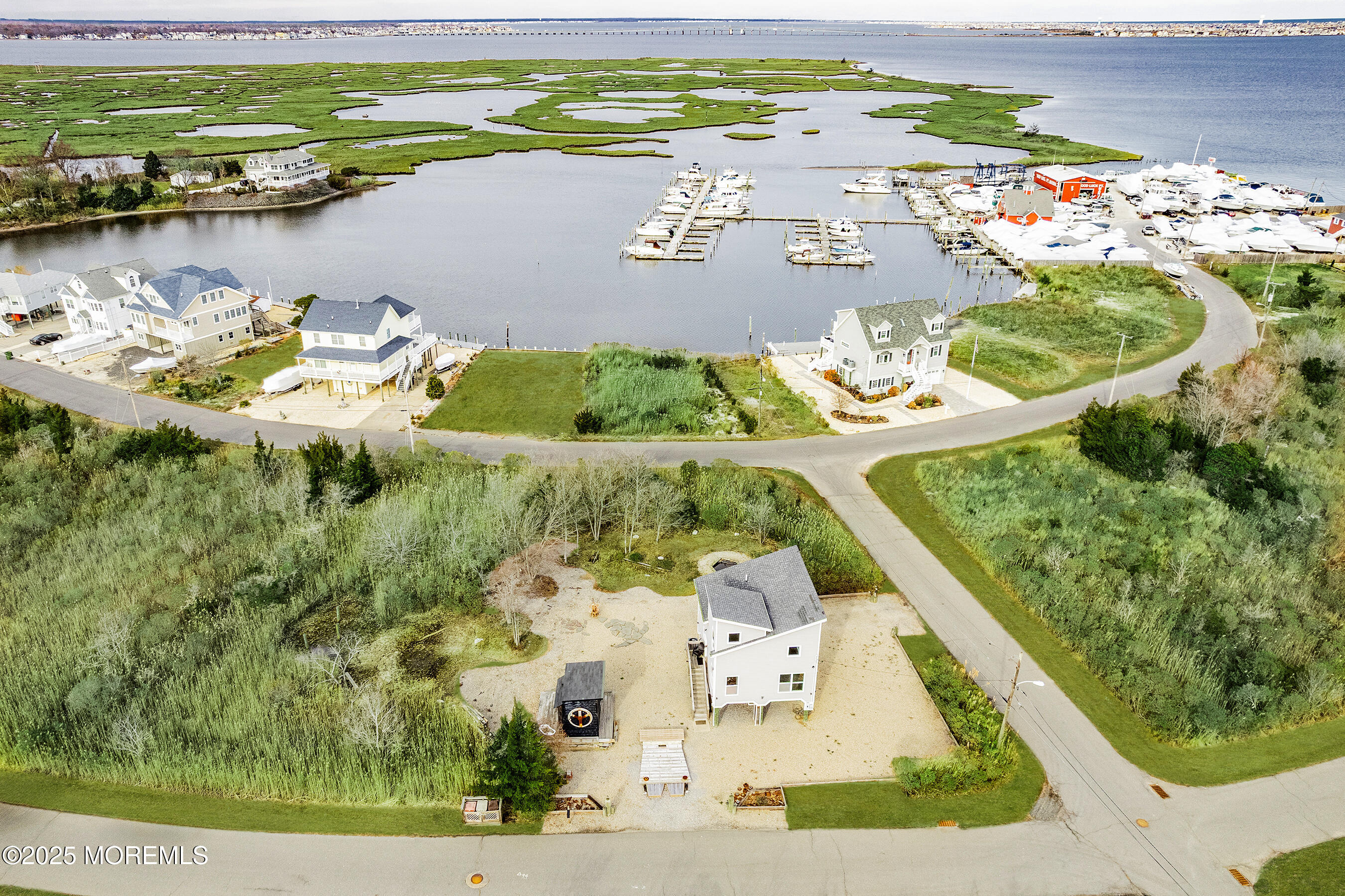 54 Beach Avenue Bayville, NJ 08721 - Photo 25 of 31 a view of an outdoor space and seating area