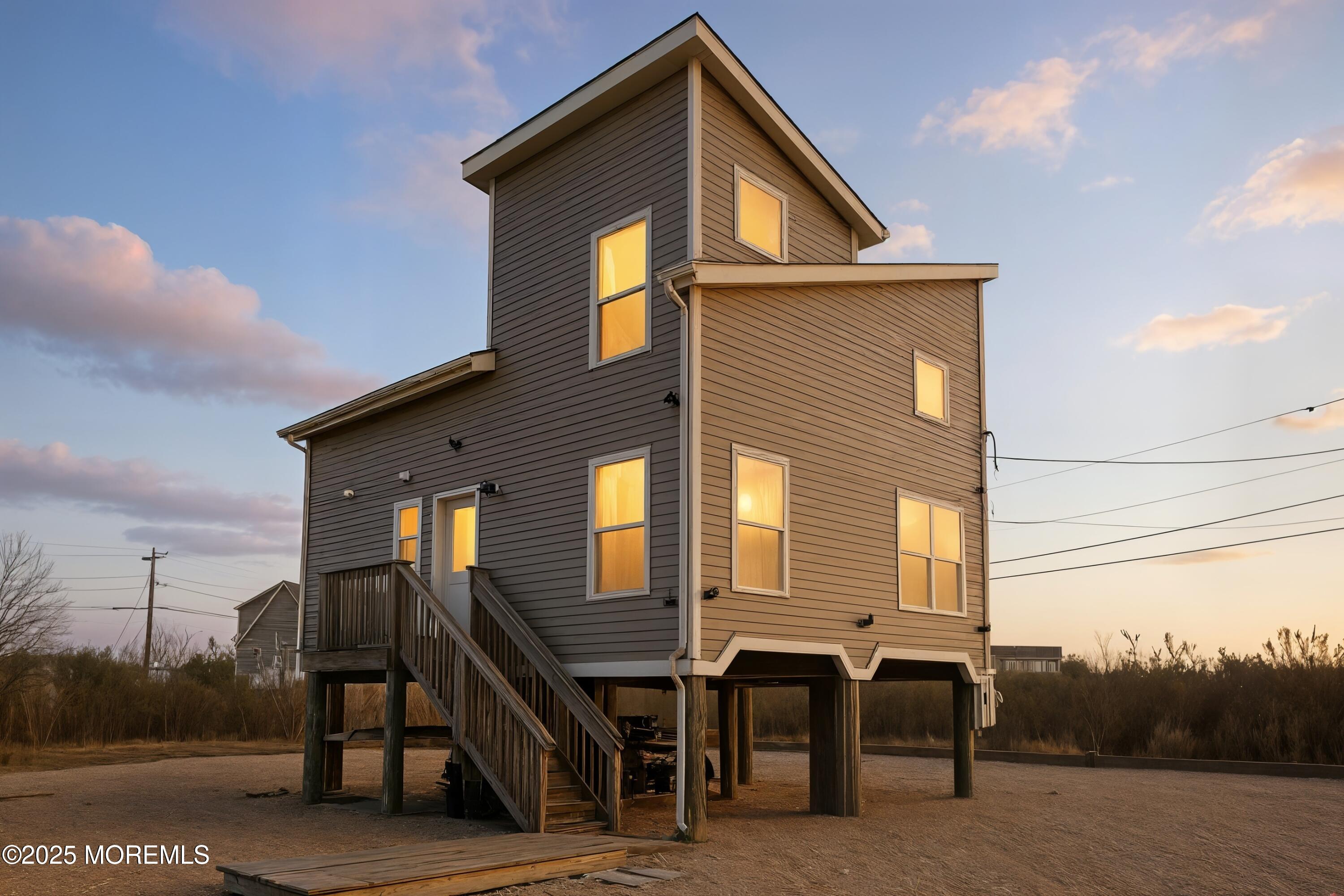 54 Beach Avenue Bayville, NJ 08721 - Photo 29 of 31 a front view of a house with mountain view