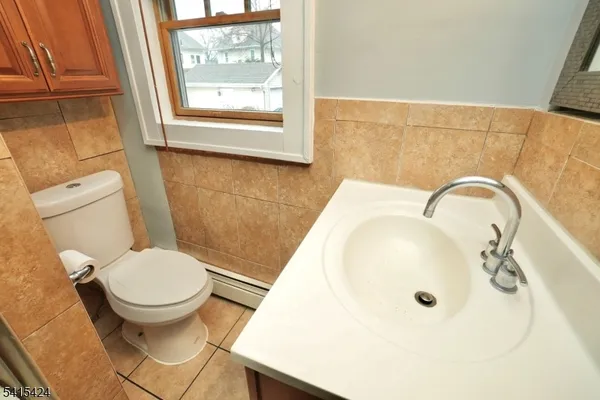 a bathroom with a sink and a toilet