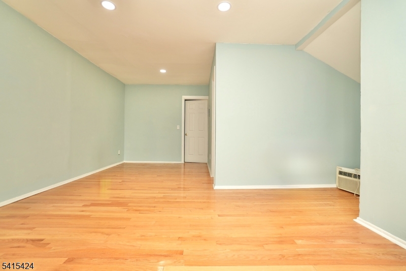 81 Berkeley Avenue Bloomfield, NJ 07003 - Photo 34 of 43 a view of an empty room