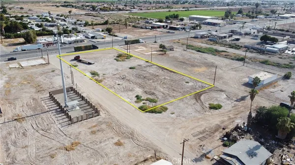 an aerial view of a backyard of a house
