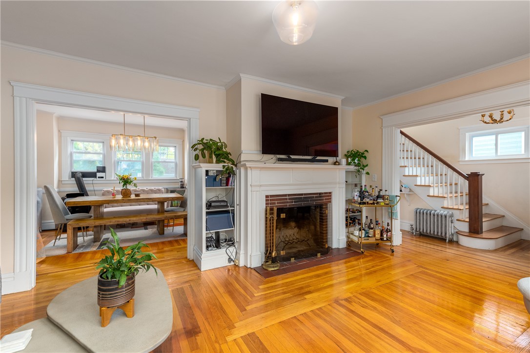 174 Rochambeau Avenue Providence, RI 02906 - Photo 9 of 32 Living room with fireplace.