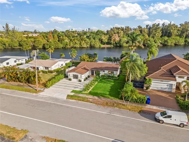 a view of a potted plant next to a window