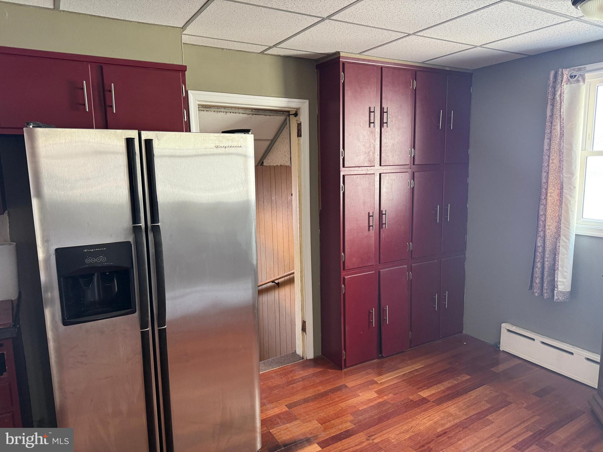4049 Marshall Road Upper Darby, PA 19026 - Photo 12 of 26 a kitchen with metallic refrigerator freezer and a dishwasher